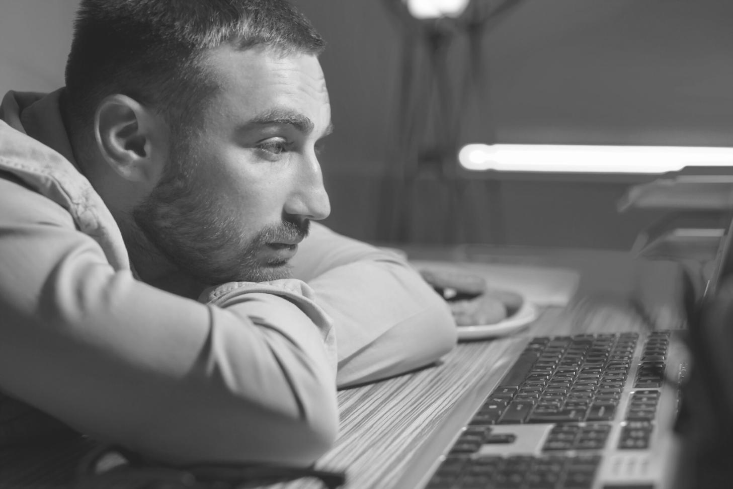 Students working with network simulation equipment in hands-on laboratory environment